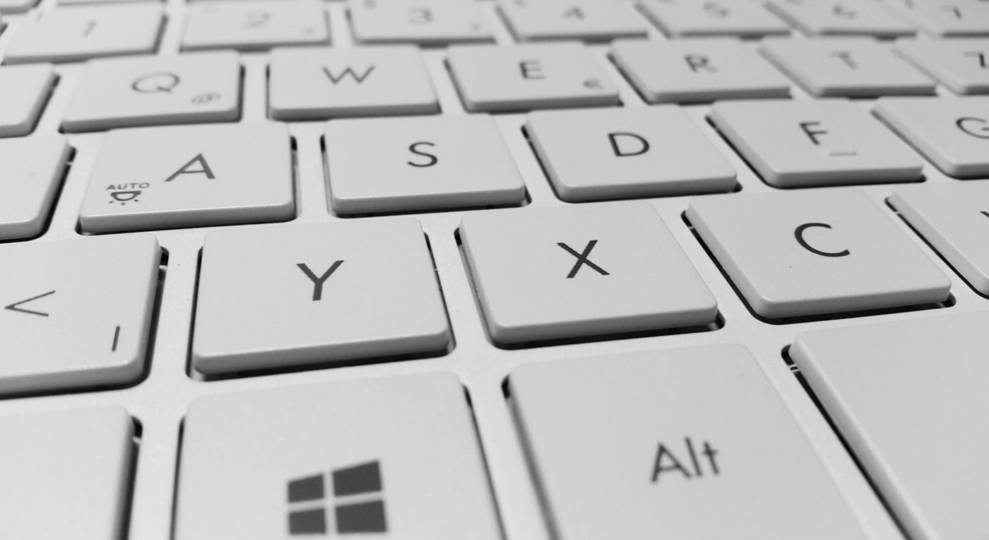 A summary checklist beside a keyboard — the project summary list gives clients a clear view of work billed