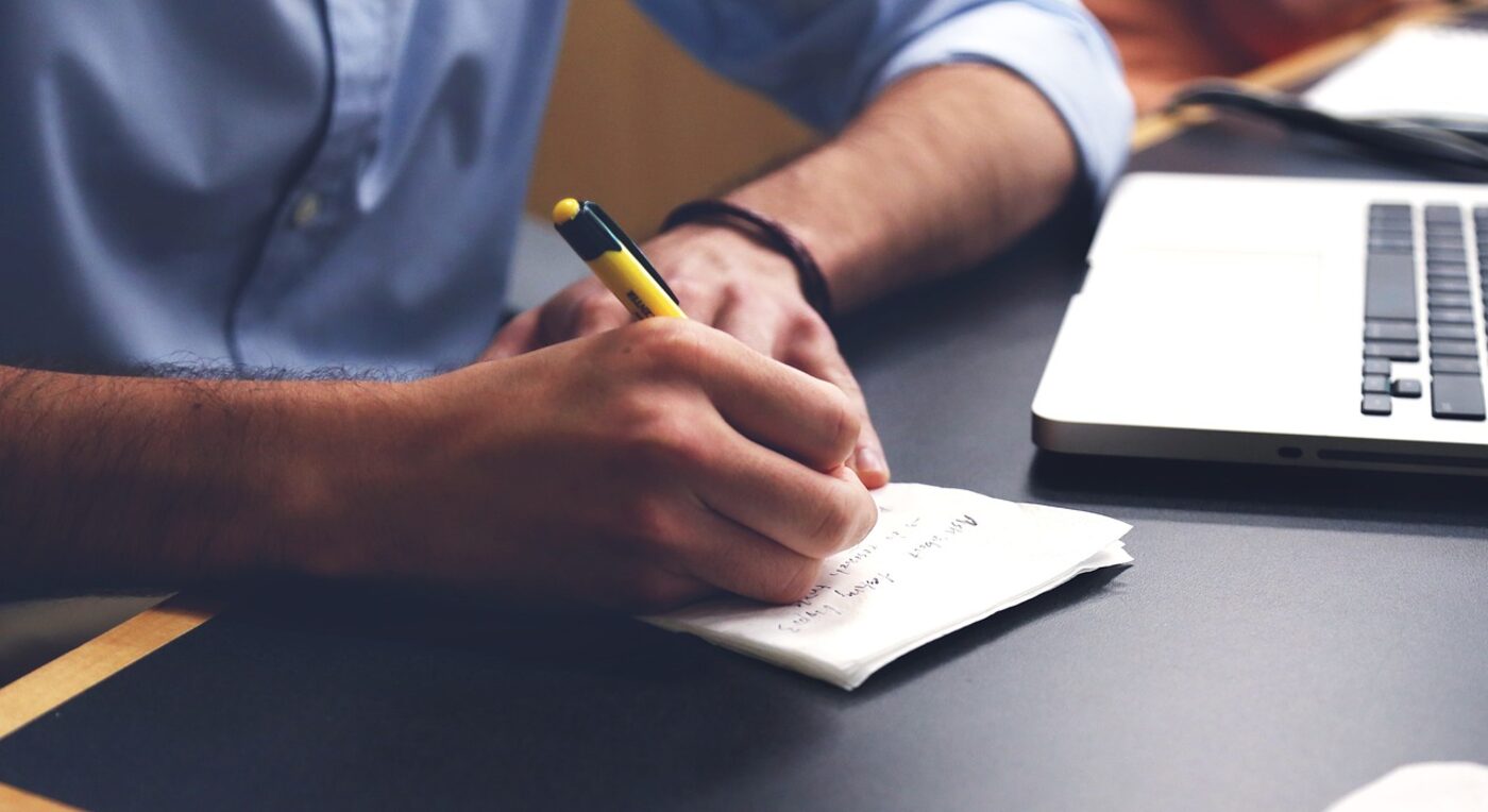 A clock on the desk of a working professional — accurate time capture is the foundation of law firm profitability