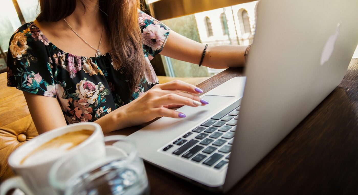 An attorney working through billing tasks on a laptop in a modern law office — platform fit shows up in the daily workflow