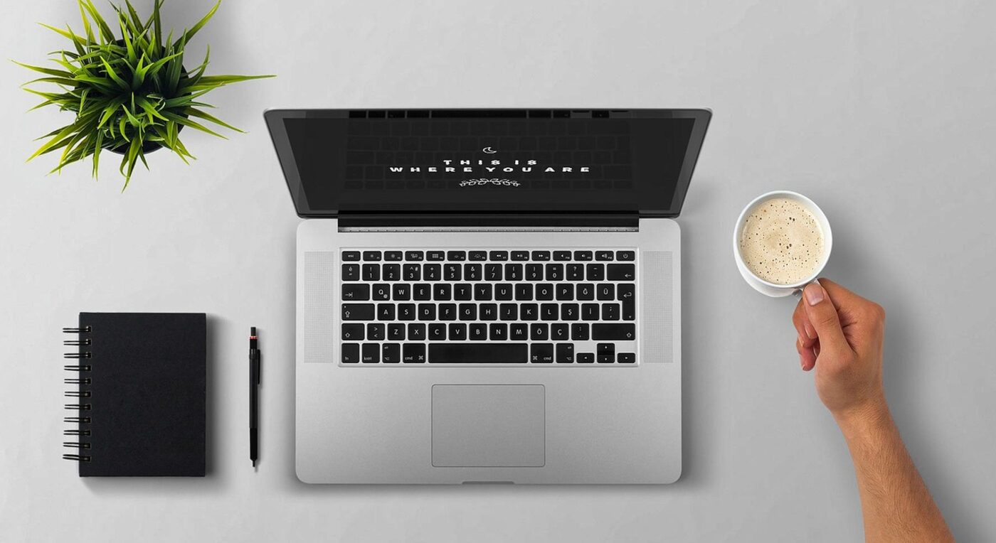 Sending an invoice from a laptop — online invoicing shortens the gap between finished work and payment